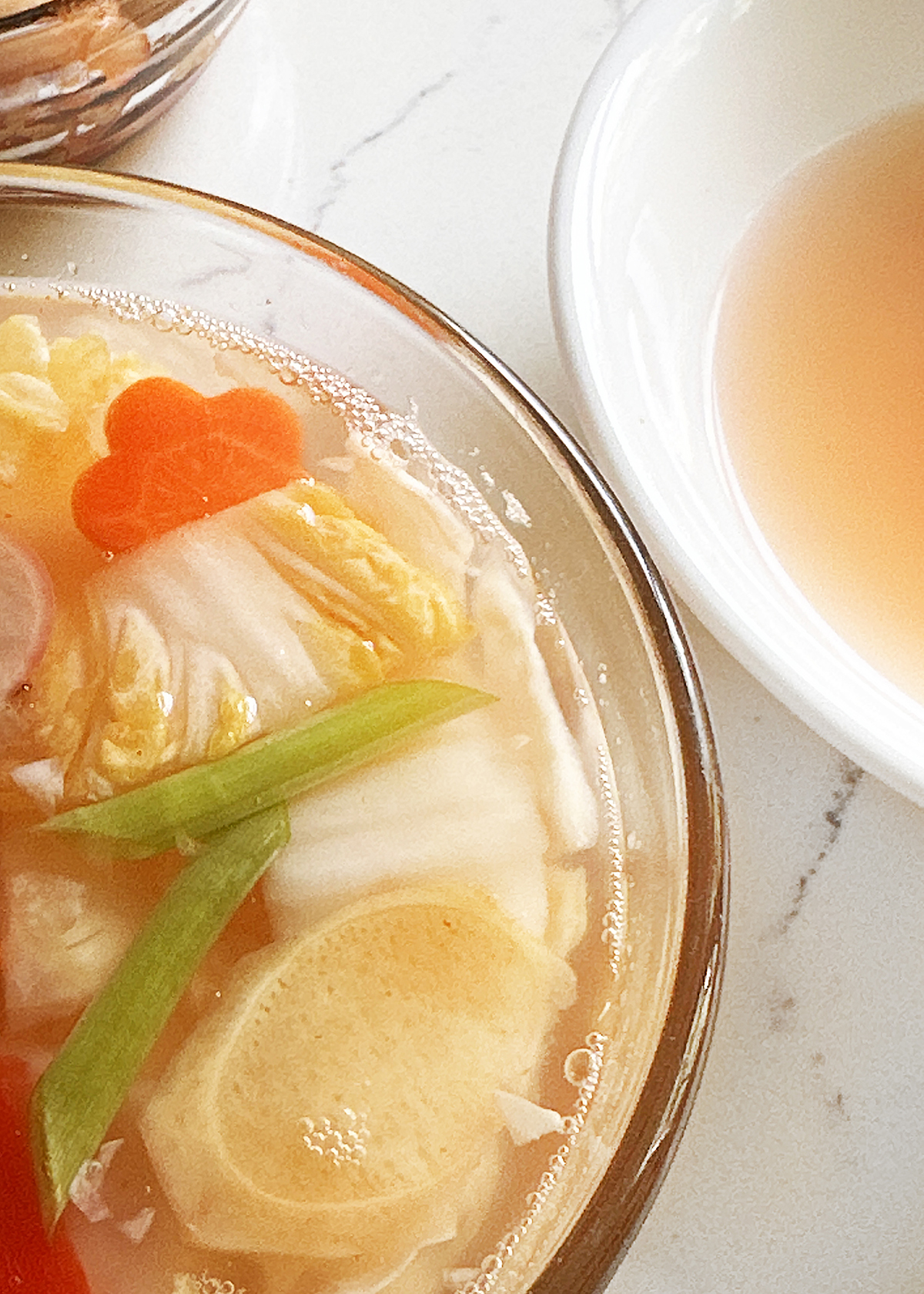 water kimchi close up fermentation bubbles