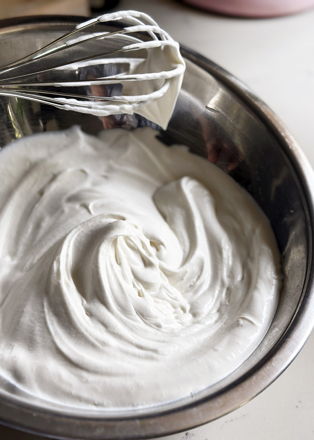 Whipped cream at soft peaks