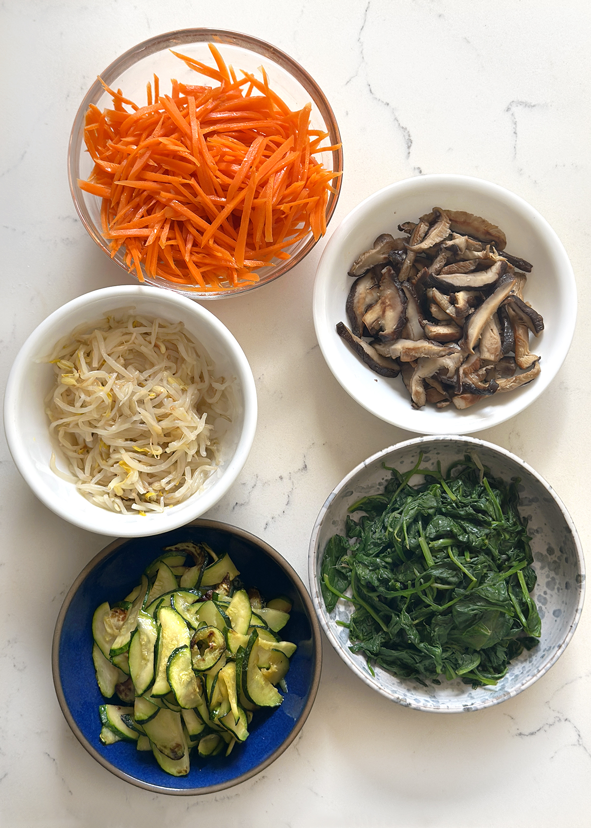 traditional bibimbap vegetable ingredients, prepped an d cooked