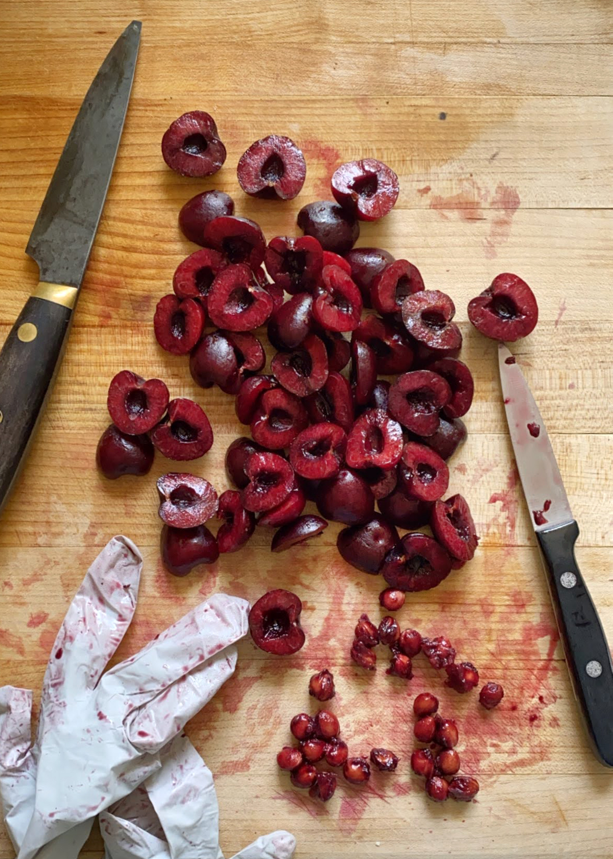 pitting cherries with a knife