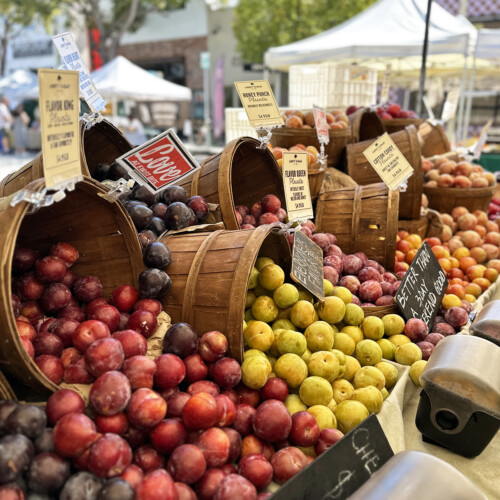 plums and peaches at farmers market