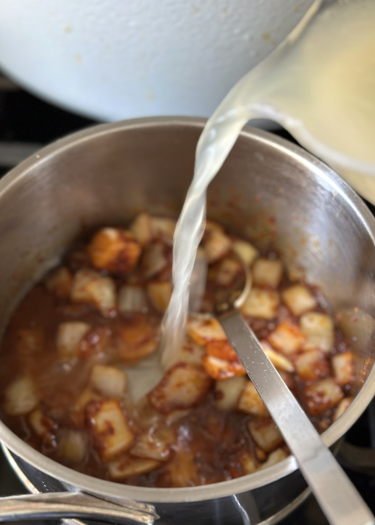 pouring broth for soon dooboo