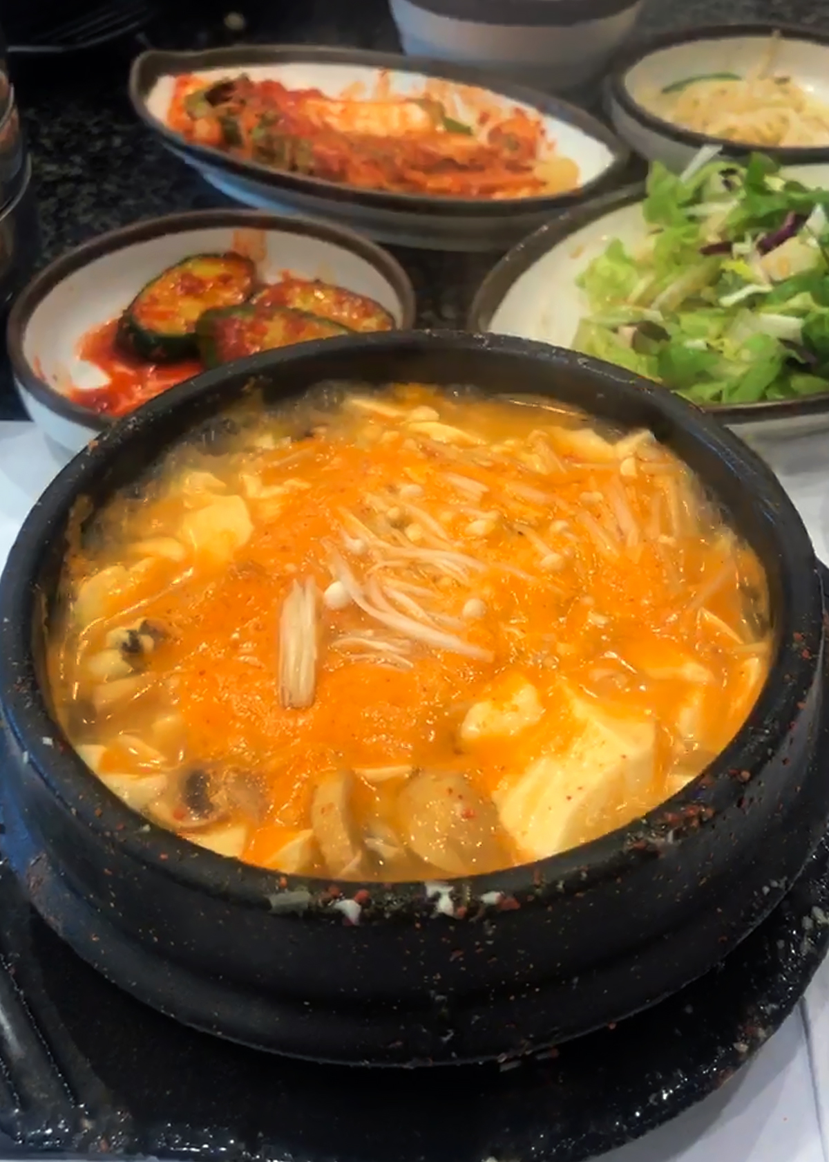 soon tofu jjigae in stone pot at korean restaurant