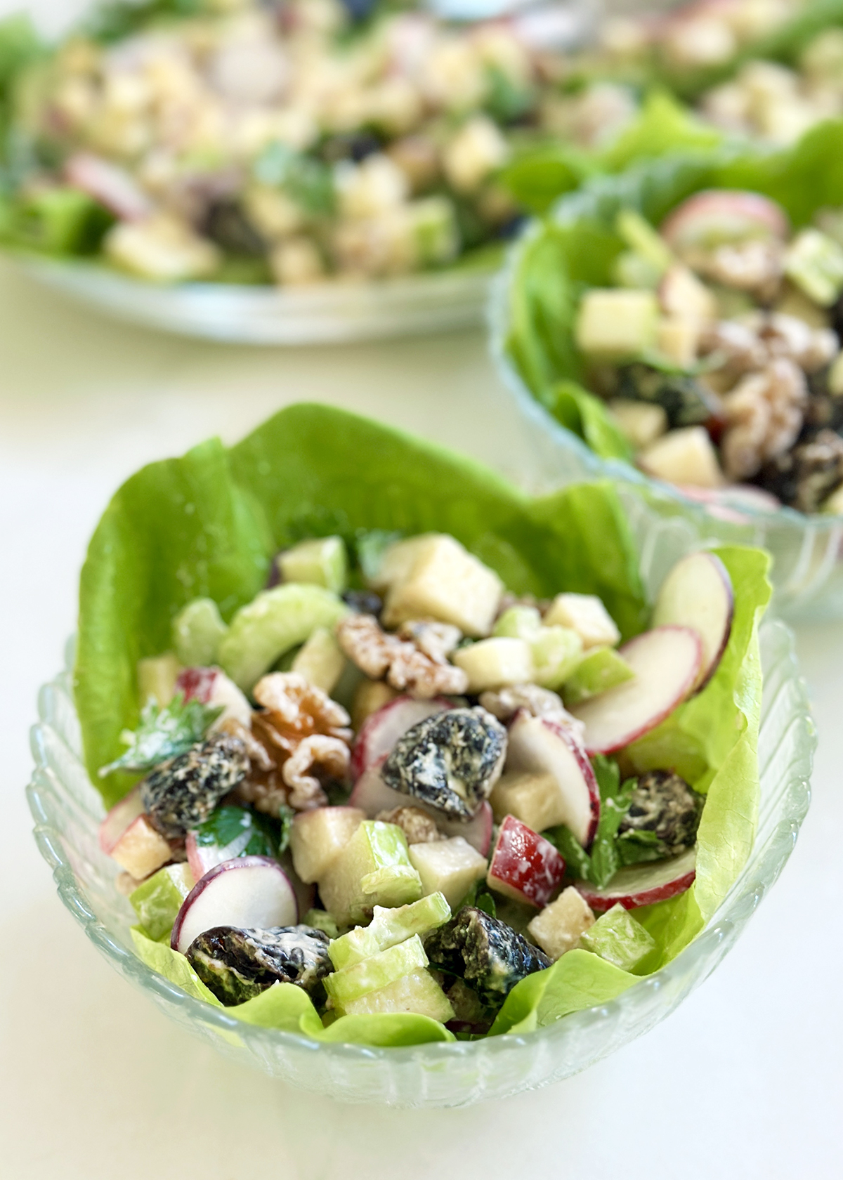 waldorf salad, california style in lettuce cups