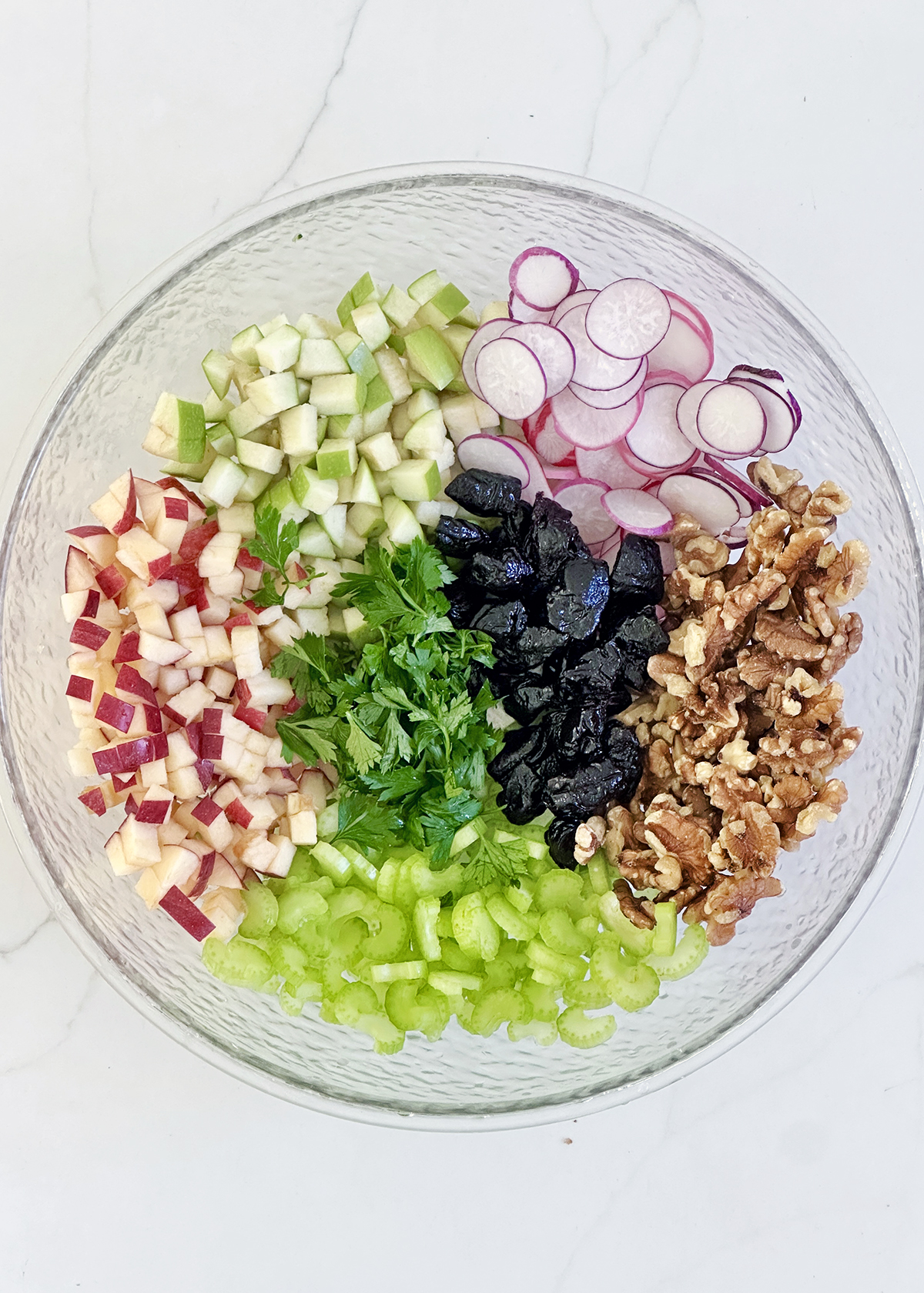 waldorf salad ingredients in bowl
